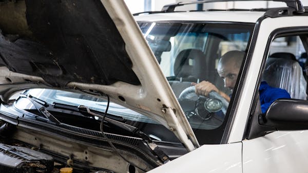 Vehicle being prepared for transport